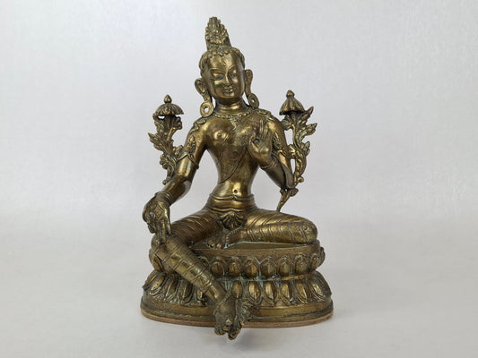 Authentic tibetan buddha statue from the middle of the 20th century. High detail in brass for collectors, buddhist altar and high end oriental interior
