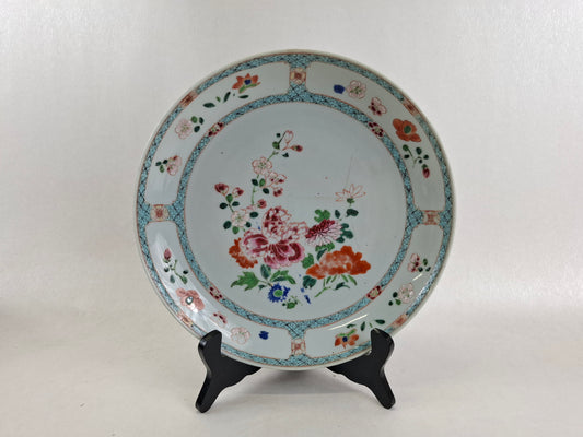187th century Qianlong famille rose porcelain plate with hand painted floral decoration in polychrome enamels