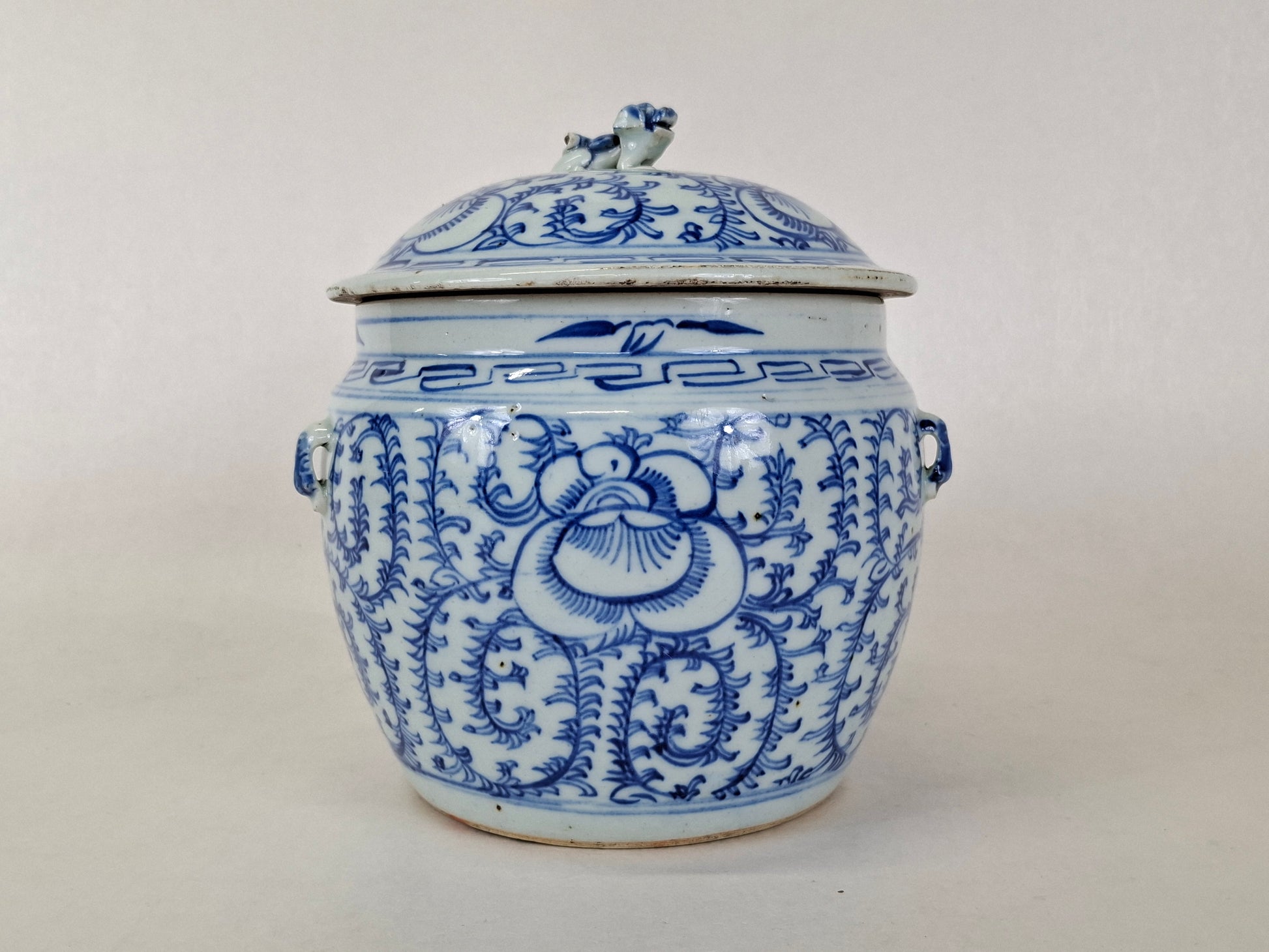 antique 19th century hand painted blue and white Chinese flower jar with foo dog handle