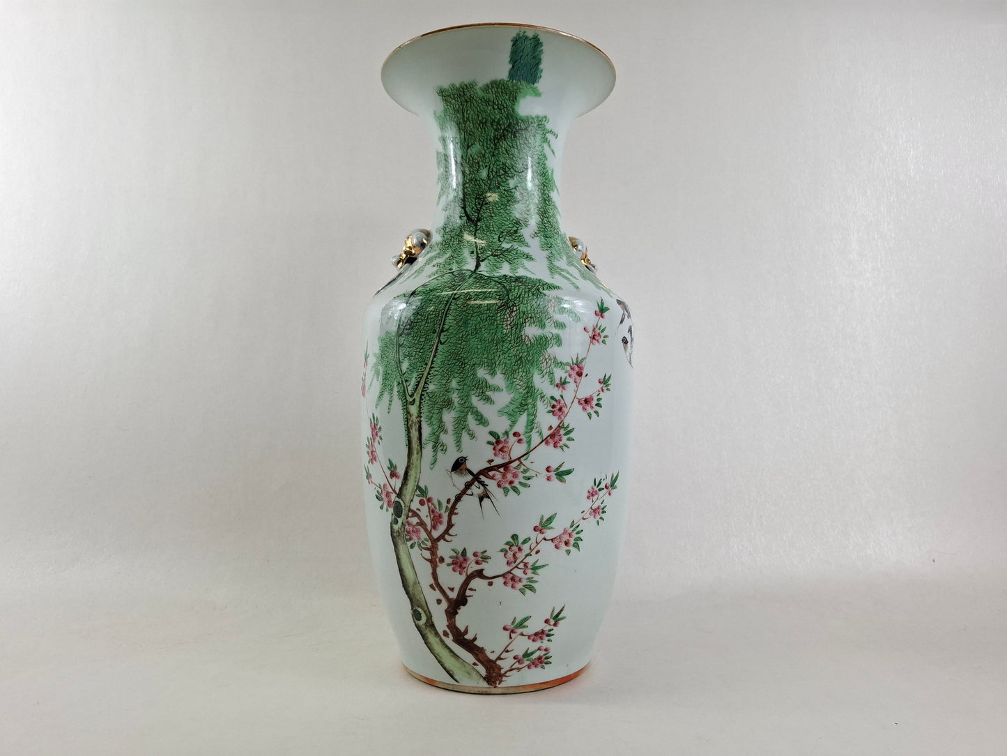 Antique handpainted Chinese polychrome vase decorated with swallows and blossoms 