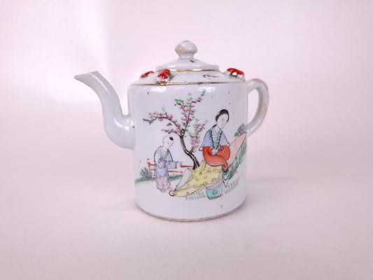 Antique Chinese handpainted qianjiang teapot with a garden scene and Chinese calligraphies