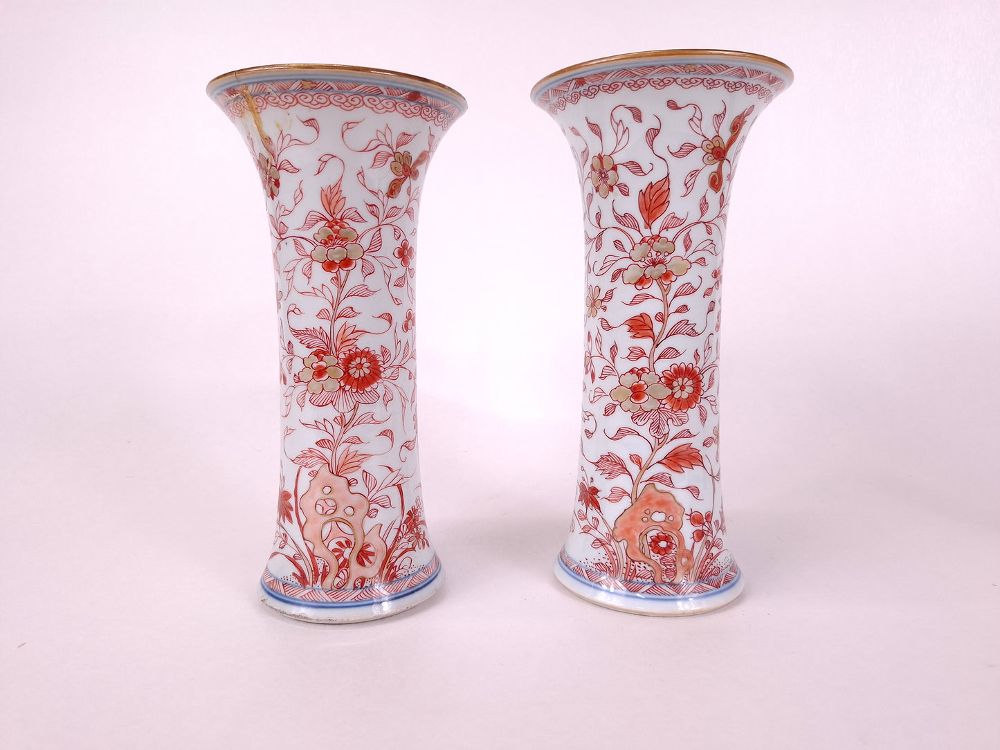 Pair of 18th century iron red Kangxi vases in imari style