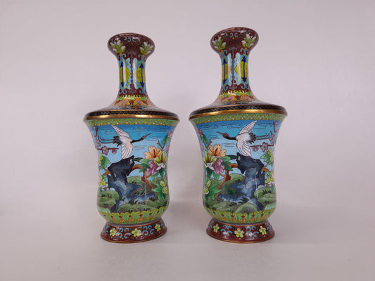 A pair of high quality Chinese cloisonne vases decorated with cranes