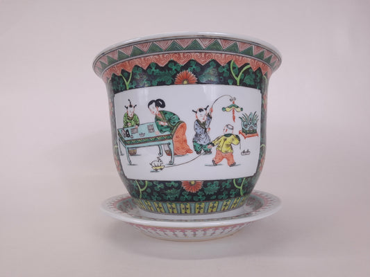 Vintage Chinese famille noir planter decorated with playing children