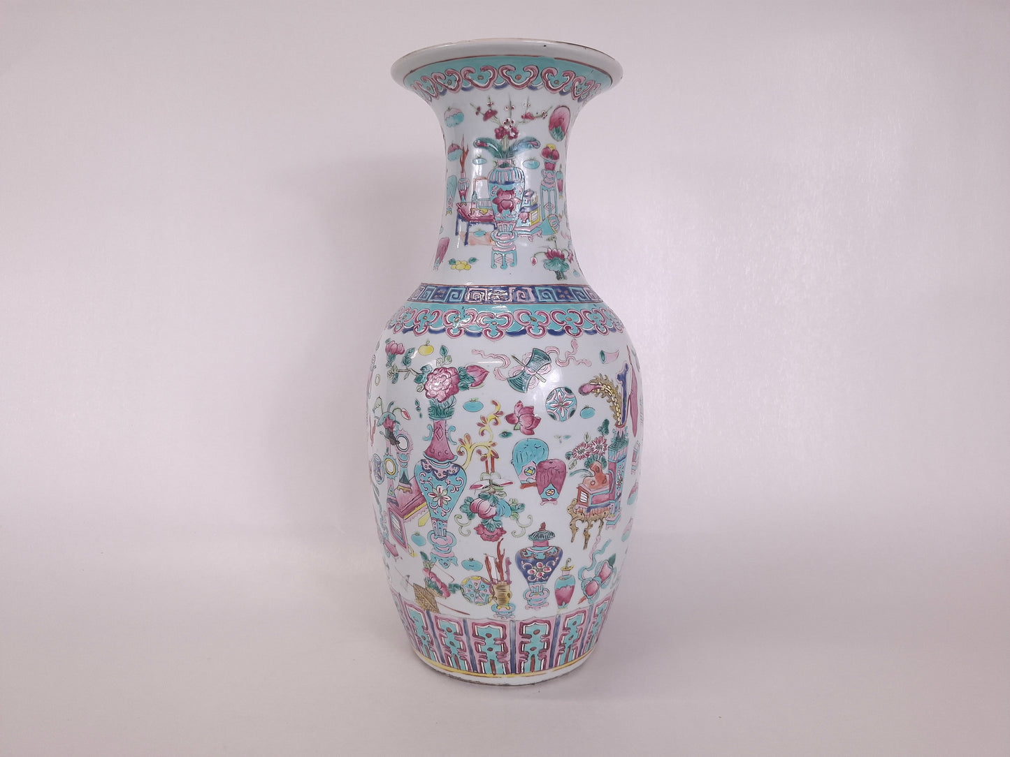 A tall handmade antique Chinese 19th century famille rose vase with 100 treasures