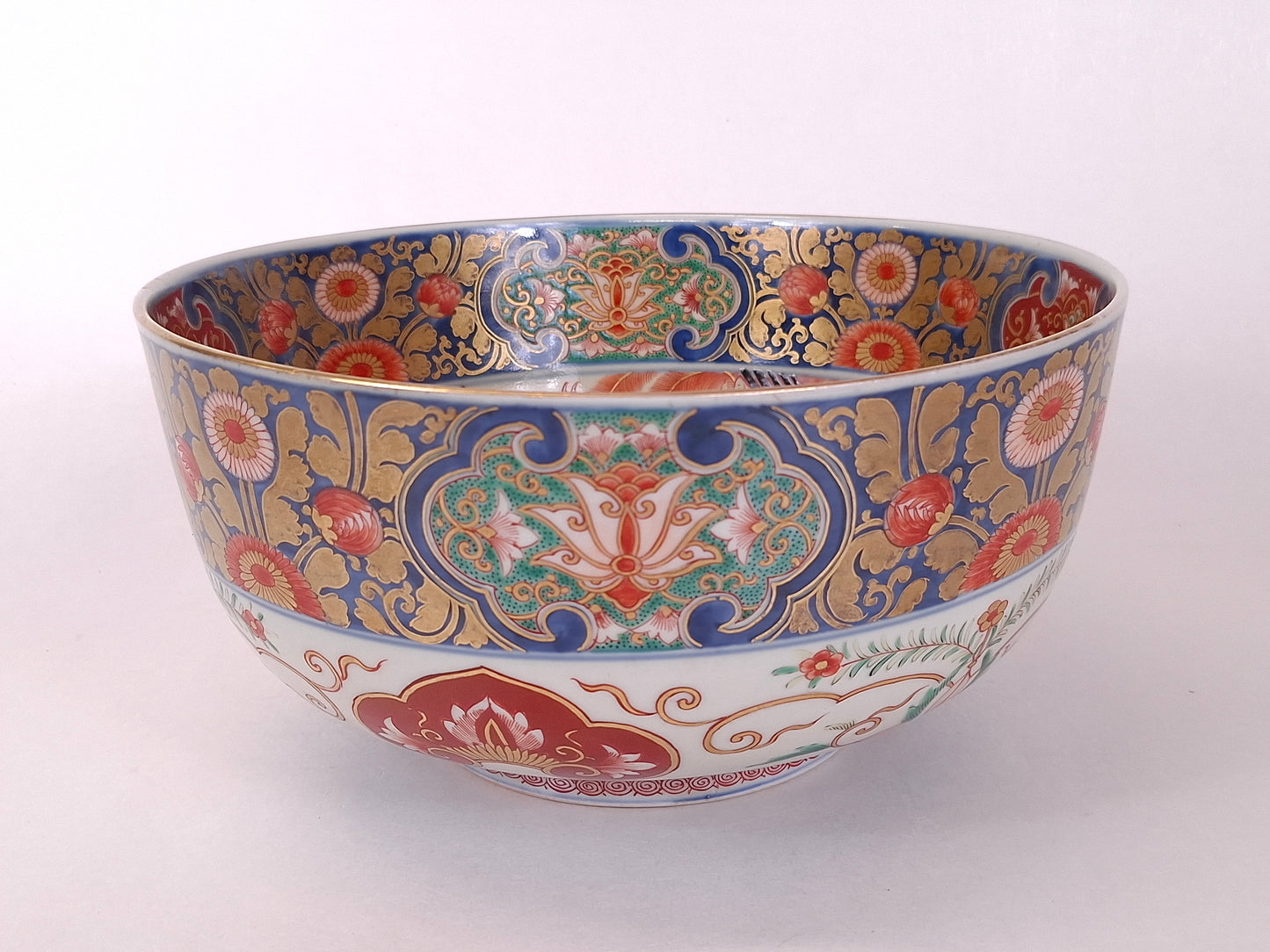 Antique 19th century handpainted Japanese imari punchbowl decorated with a Kitagawa Utamaro scene and chrysanthemums