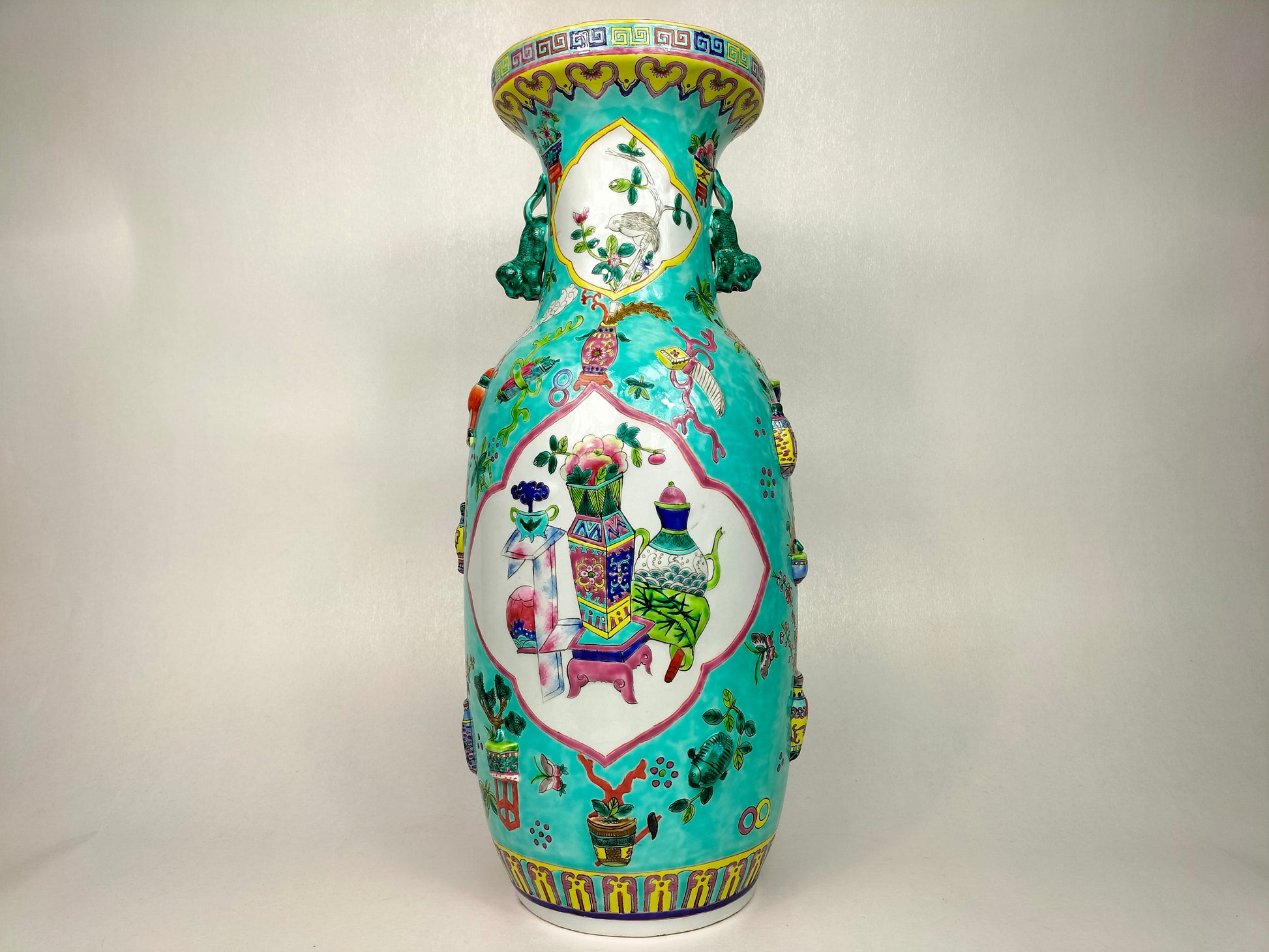 Large Chinese turquoise vase decorated with antiquities in relief