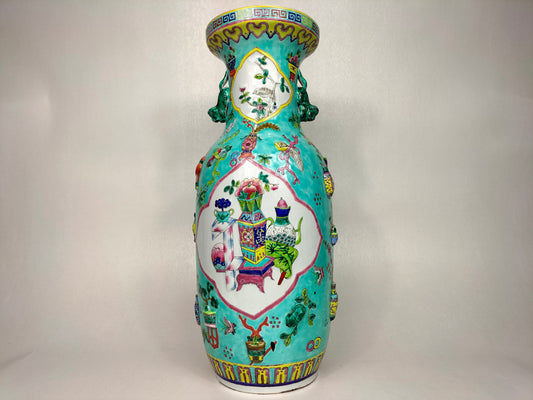 Large Chinese turquoise famille rose vase decorated with antique treasures