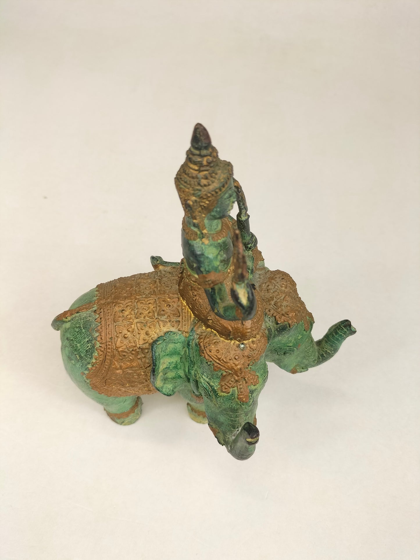 Bronze gilded statue of a temple guardian riding an elephant // Thailand - 20th century