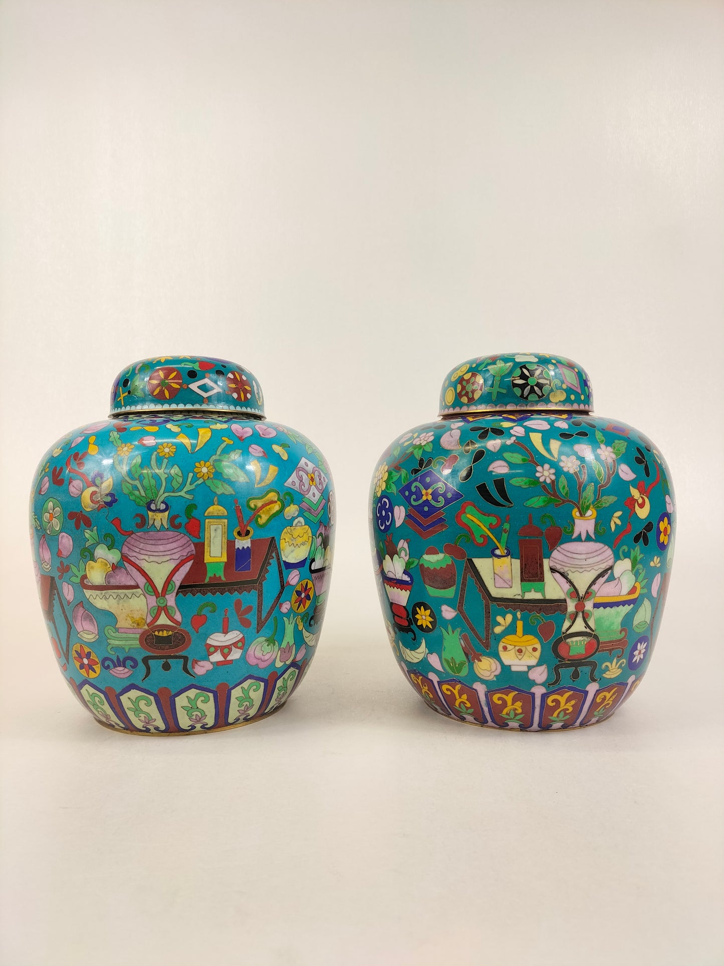 Set of 2 Chinese cloisonne ginger jars decorated in antique treasures // 20th century